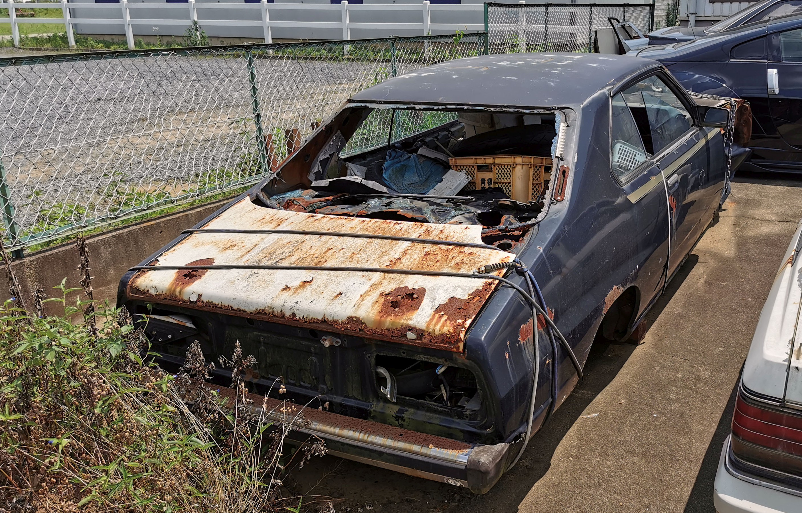 Skyline C211 Awaits Restoration in a Small Workshop in Chiba